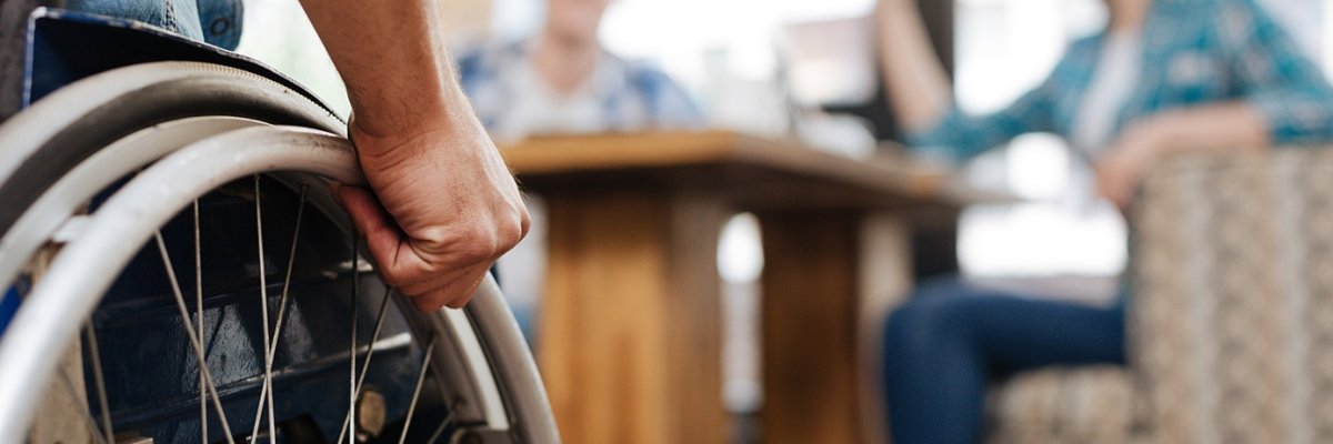 Confident handicapped man meeting his friends Confident handicapped man meeting his friends