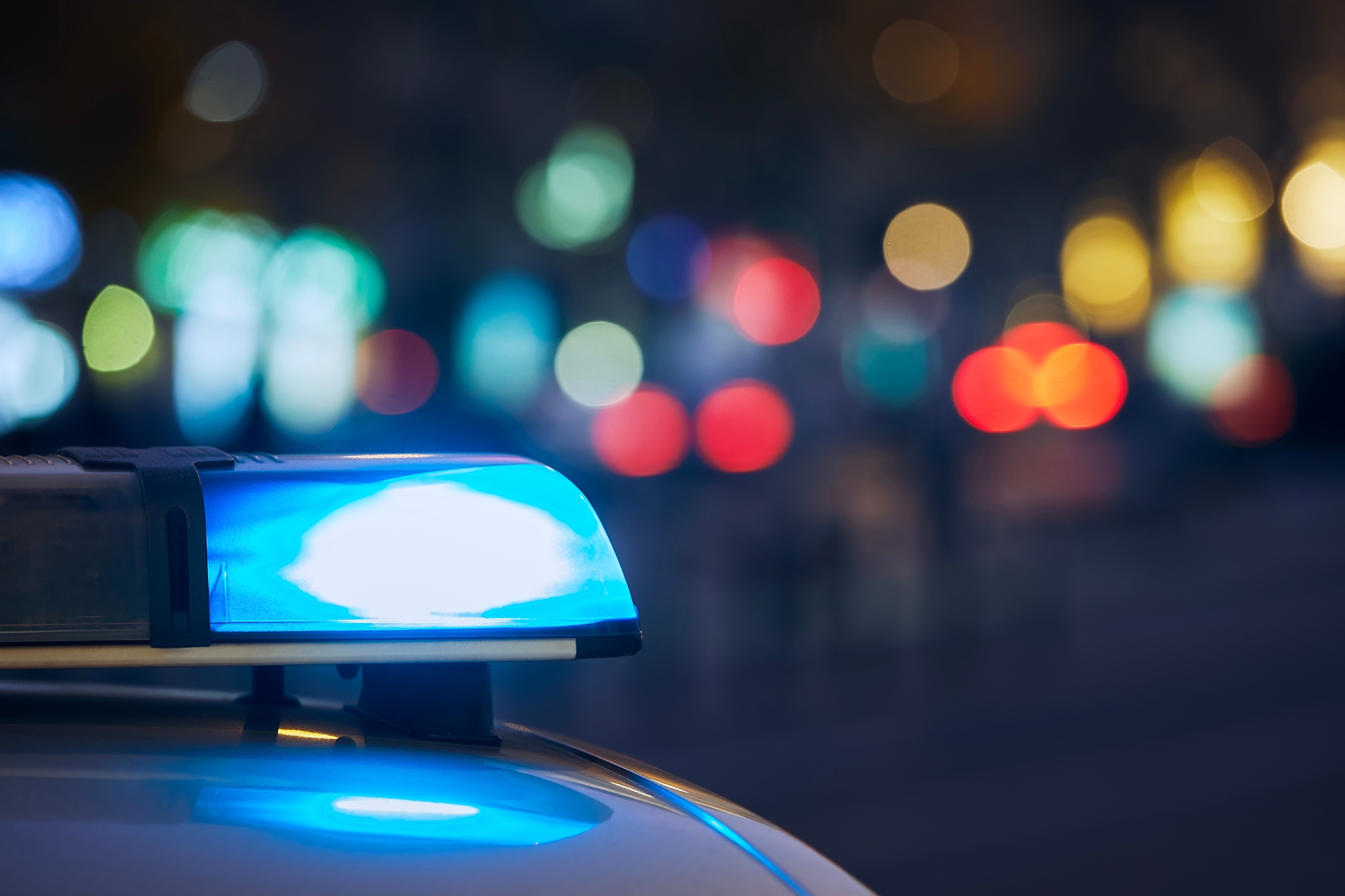 Blue flasher light of siren of police car Blue flasher light of siren of police car