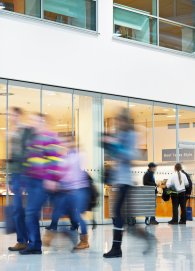 Intentional Blurred Image of People in Shopping Center Intentional Blurred Image of People in Shopping Center